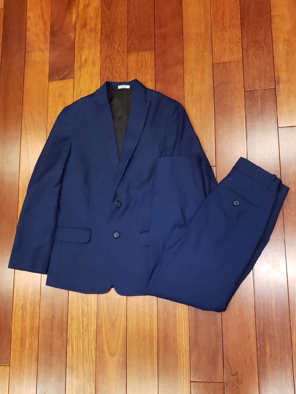 Calvin Klein Boys Blue Suit Set. Jacket size 12 Regular. Slacks size 10 Regular.
